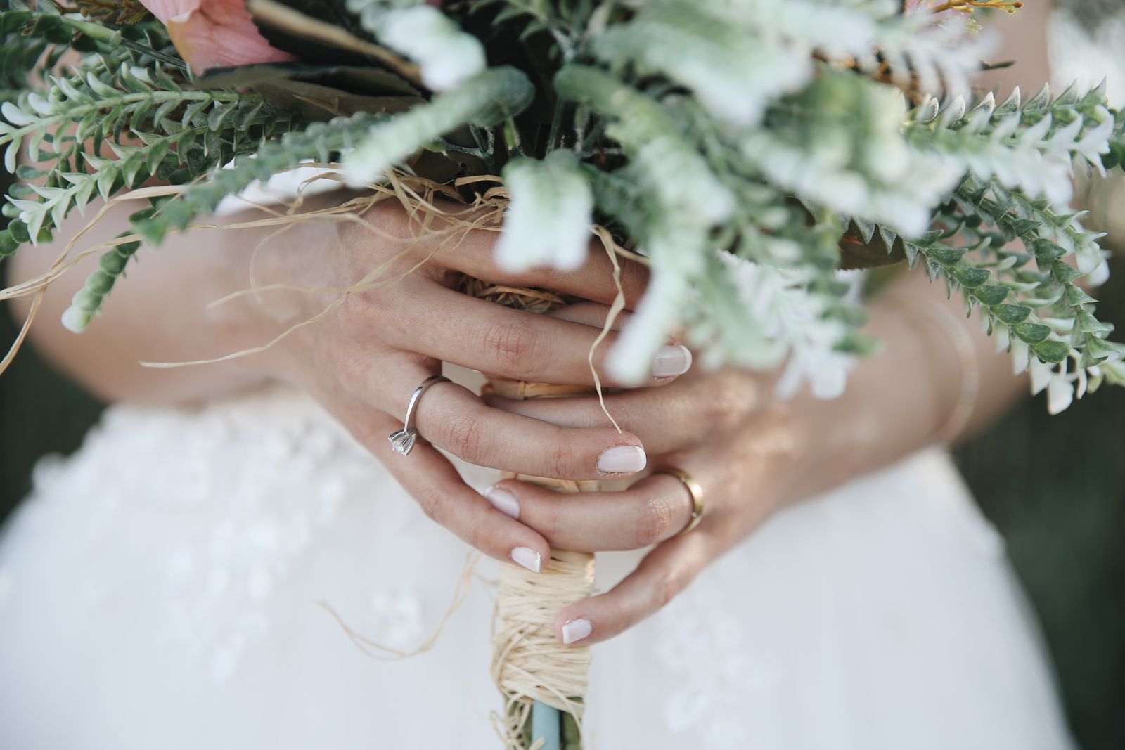 A bride holding a wedding bouquet